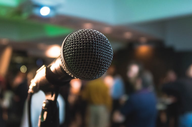 host an event microphone public speaking